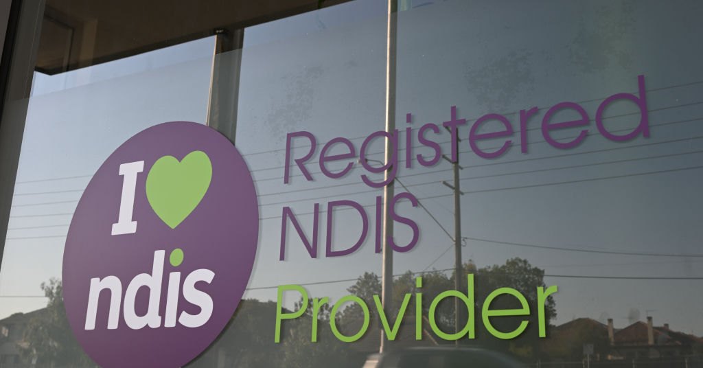 Registered NDIS Provider sign on a window